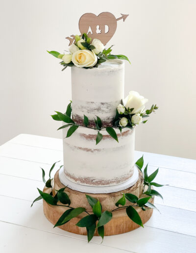 Luxury two tier semi naked cake with fresh blooms - Pictured at Camel Studio Cornwall - Dollybird Bakes