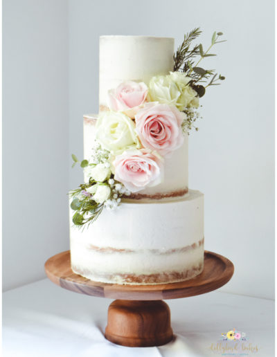 Wedding Cake - Pretty Floral Cascade on a Semi Naked Cake