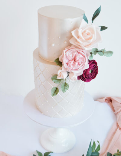 Luxury Wedding Cake - Close up image of sugar flowers, david austin roses, sweet avalanche and ranunculus