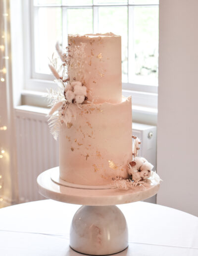 Luxury two tier full buttercream cake with fresh blooms - Pictured at Tawstock Court - Dollybird Bakes