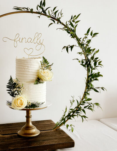 Luxury wedding cake Cornwall - Dollybird Bakes - Two tier textured buttercream wedding cake - Fresh florals - at The Green Cornwall